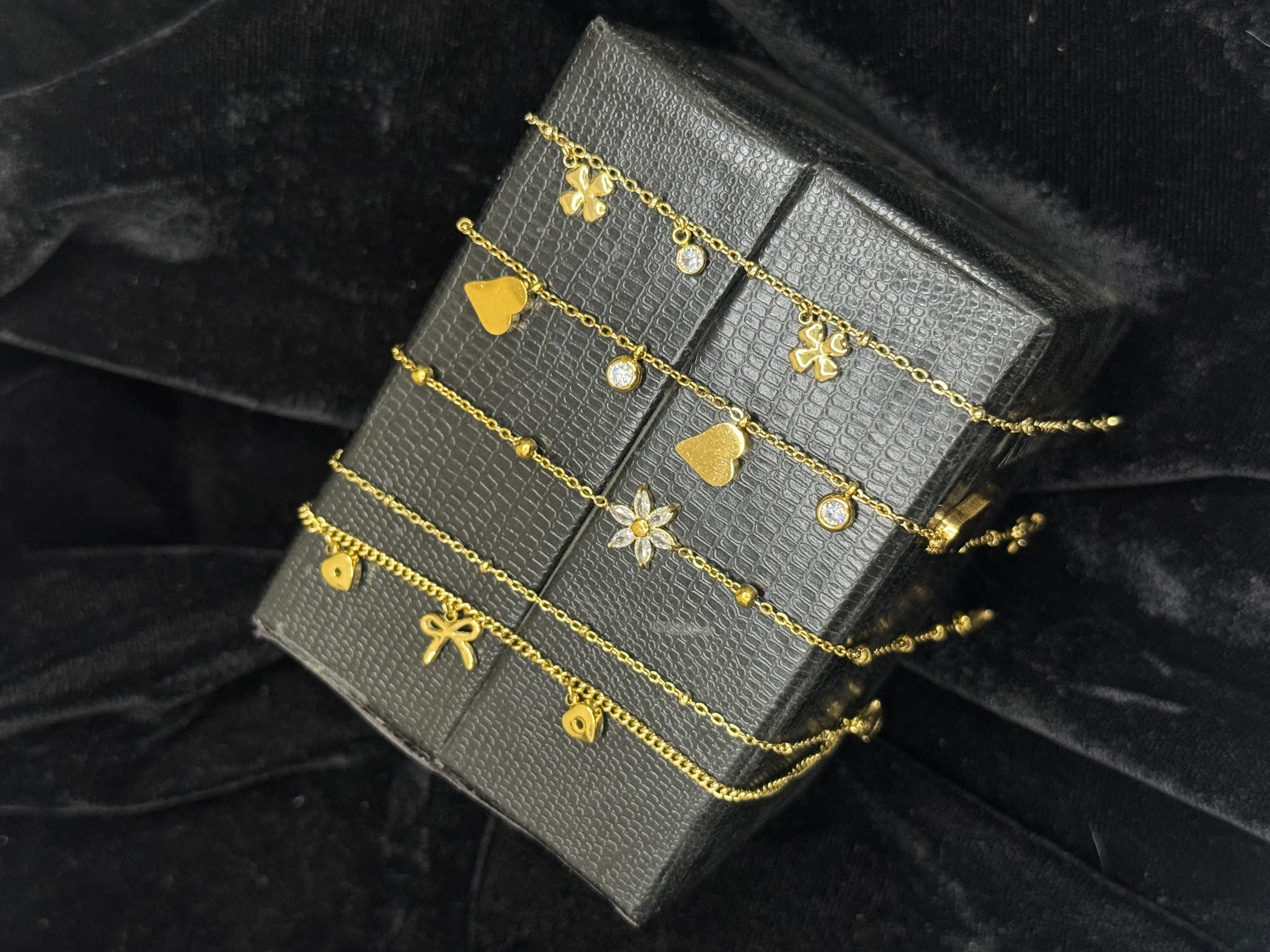 Celestial Charm Gold Bracelet Collection